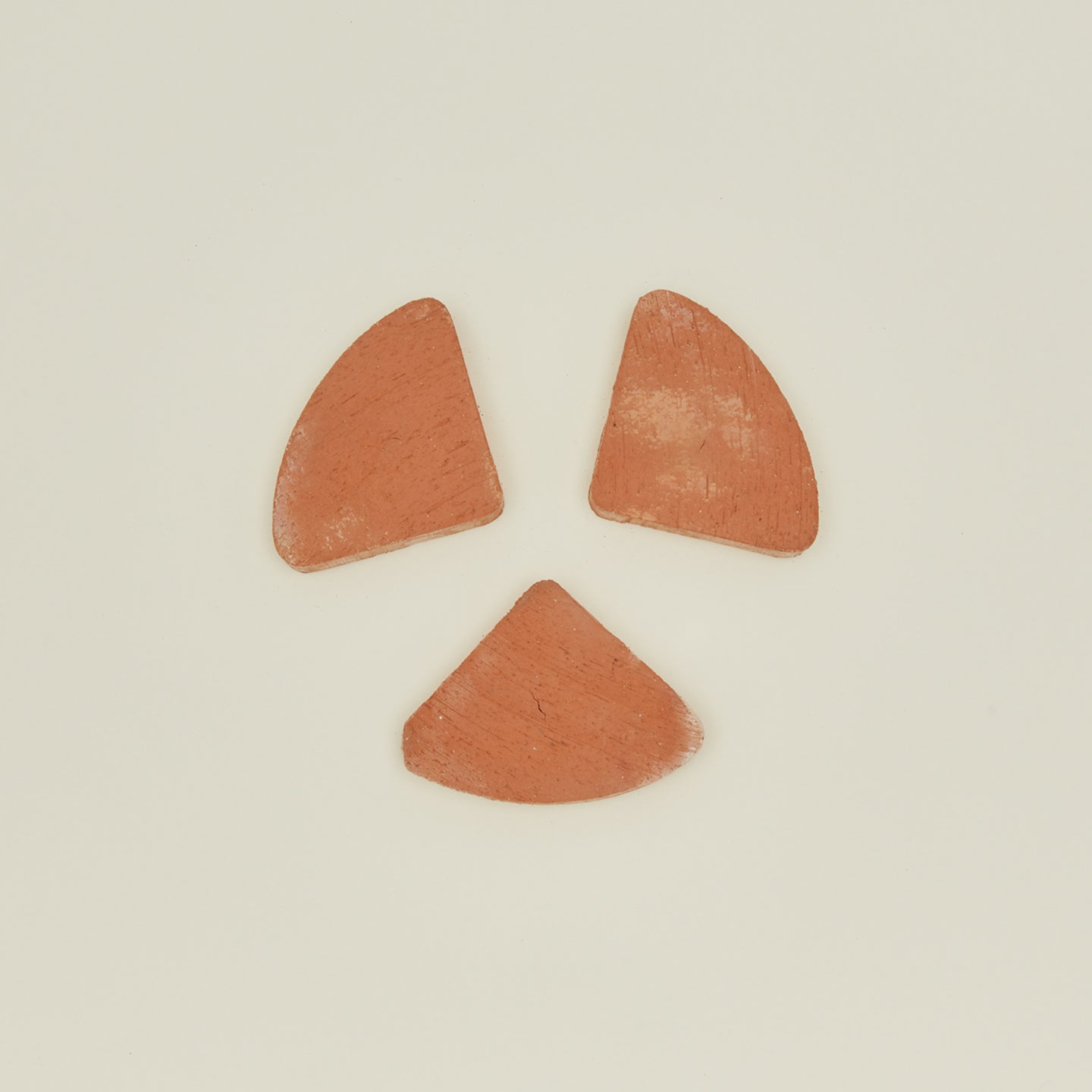Terracotta planter feet, set of three.