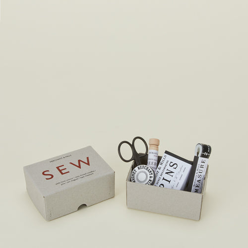 Sew box with needles, scissors, pins and measuring tape