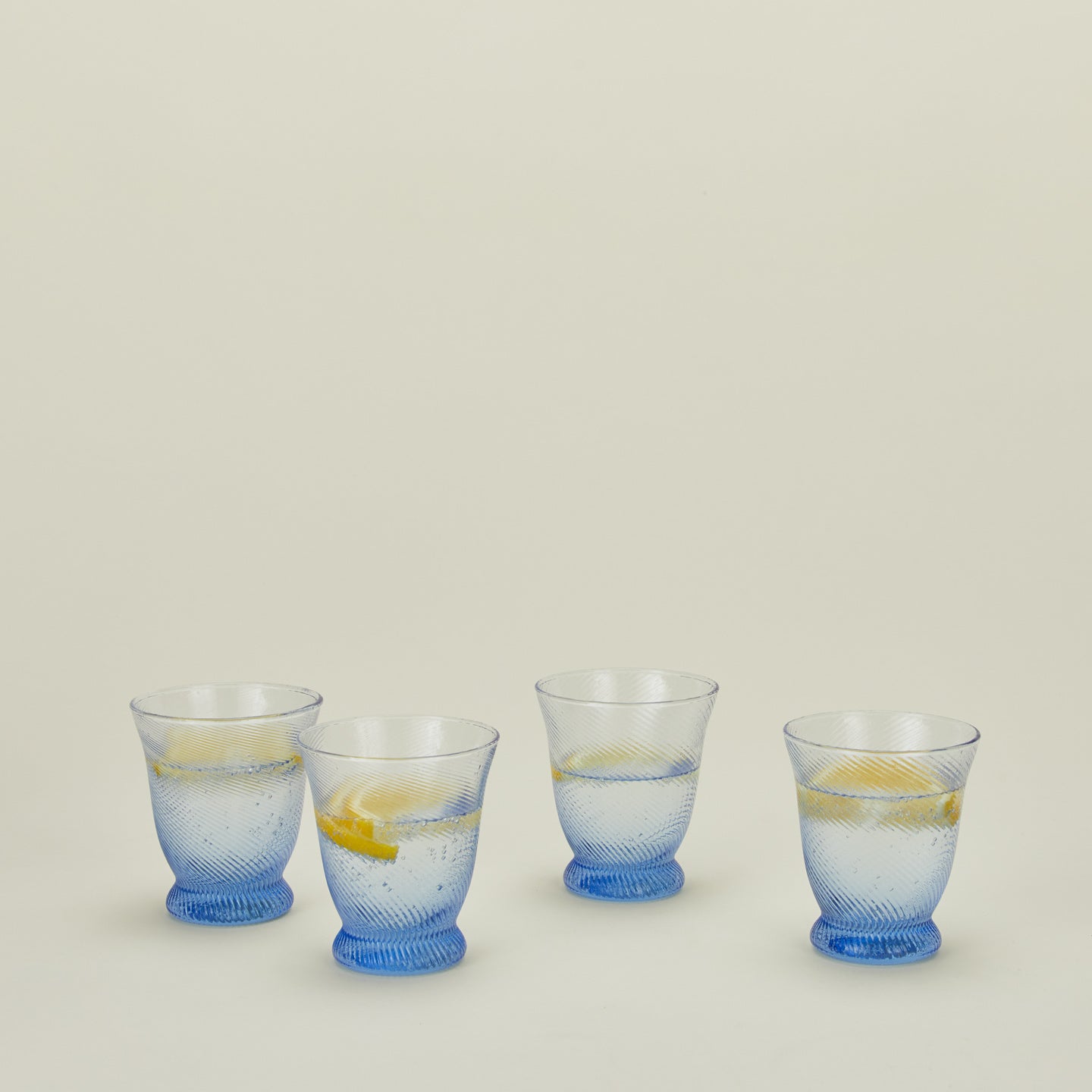 Spiral tumbler in blue with beverages