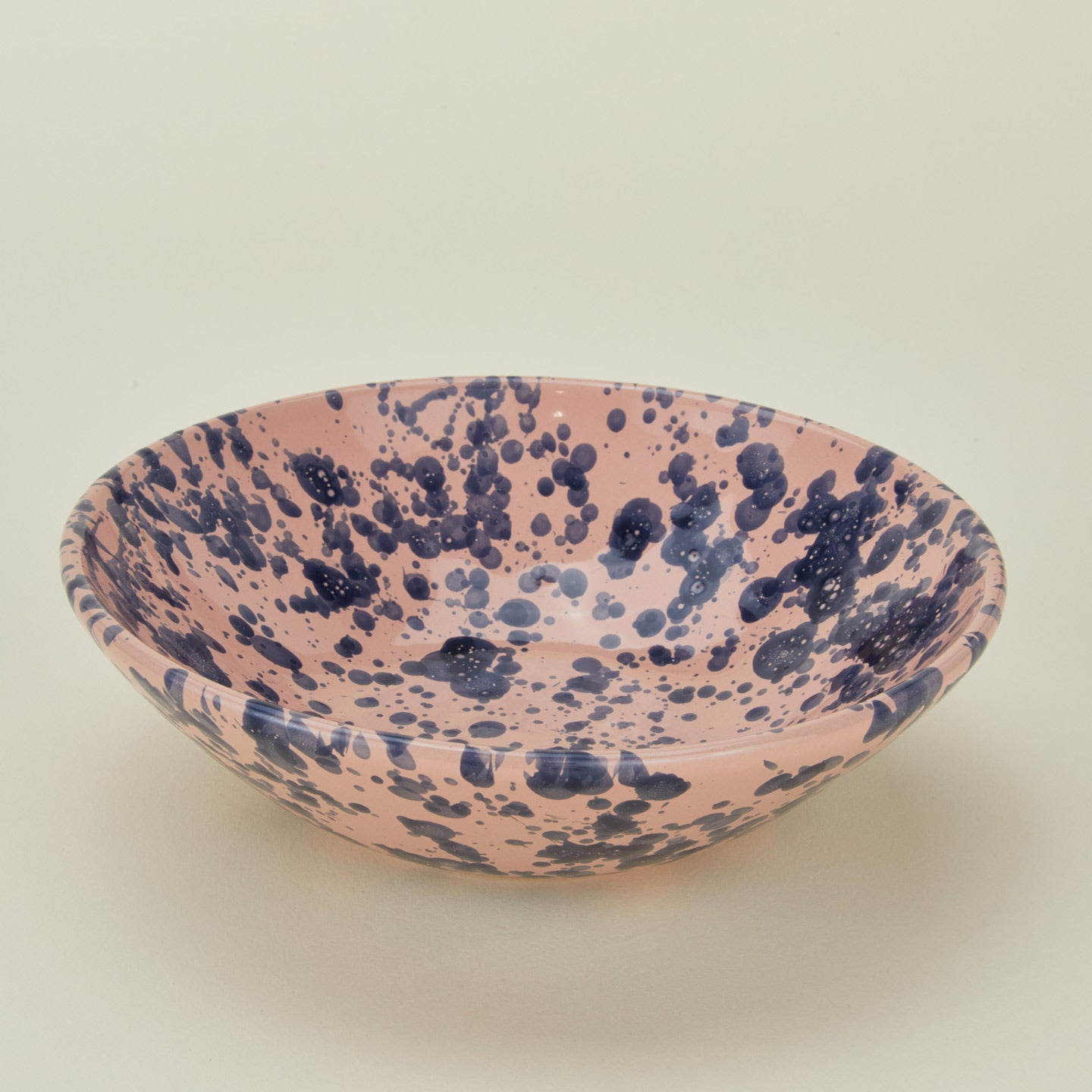Splatter low bowl in pink and blue
