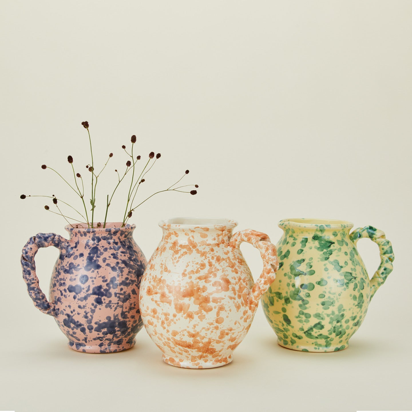 Splatter cigno jugs in various colors with florals