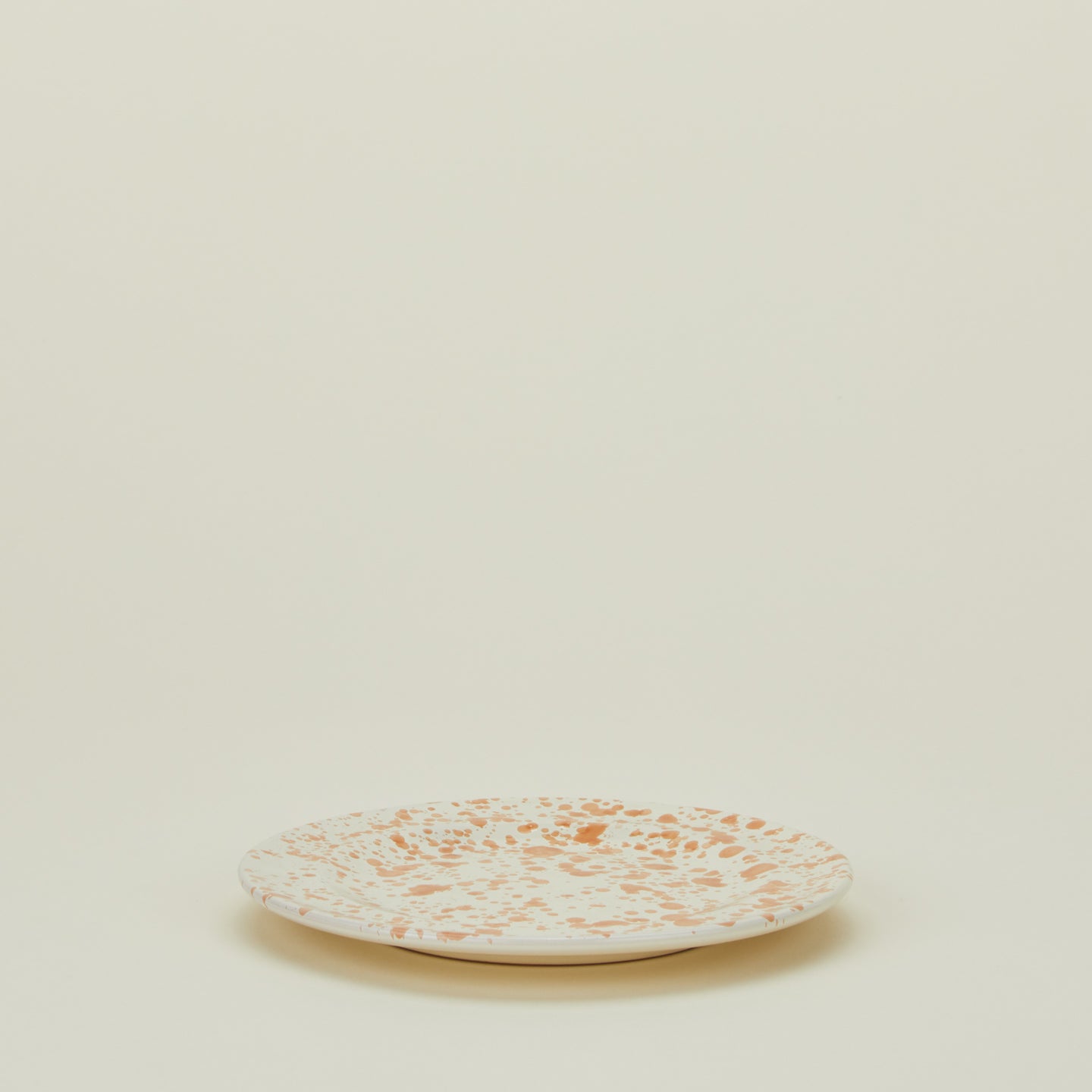 Splatter salad plate in tan and ivory
