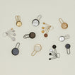 Simple measuring cups and spoons in various finishes with ingredients