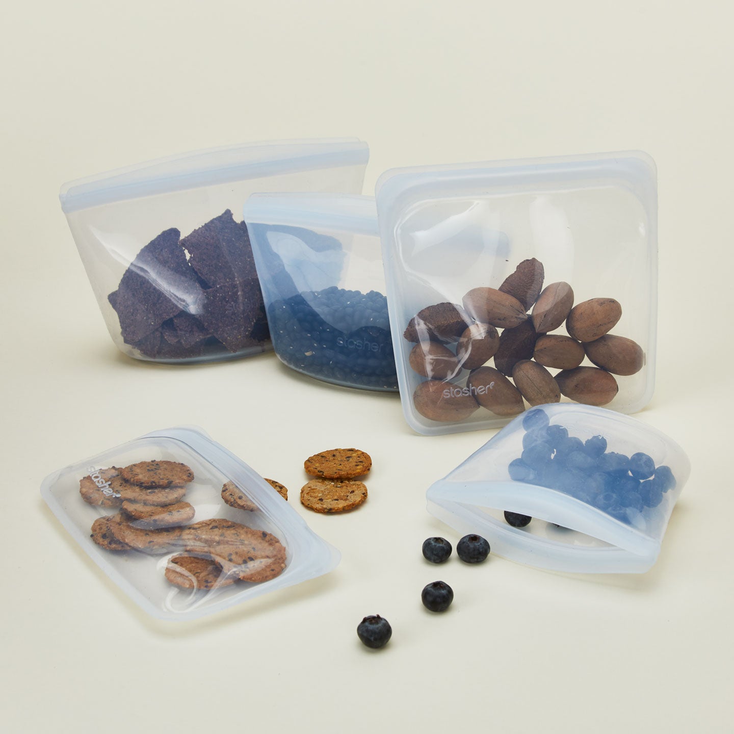 Silicone sandwich bags in three sizes with food.