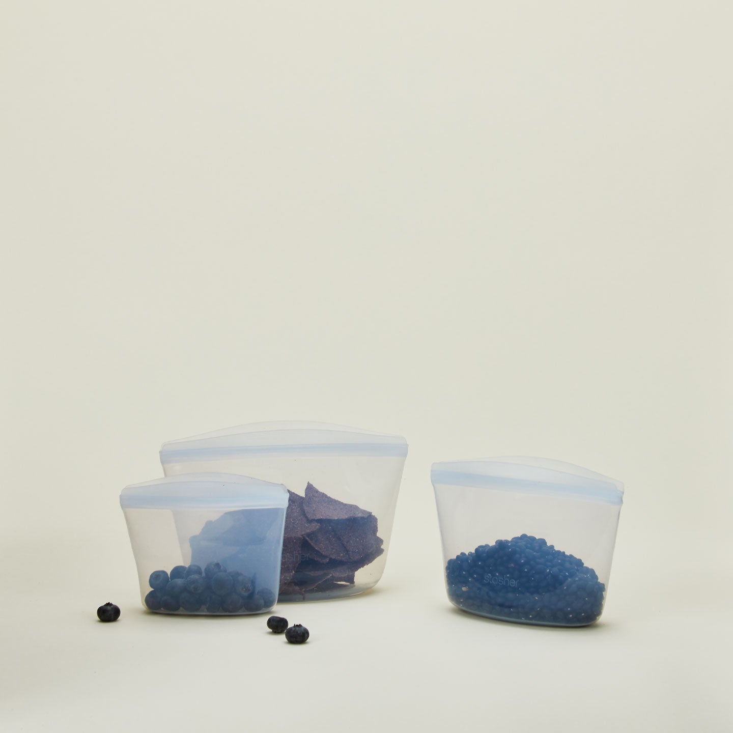 Silicone sandwich bags in three sizes with food.