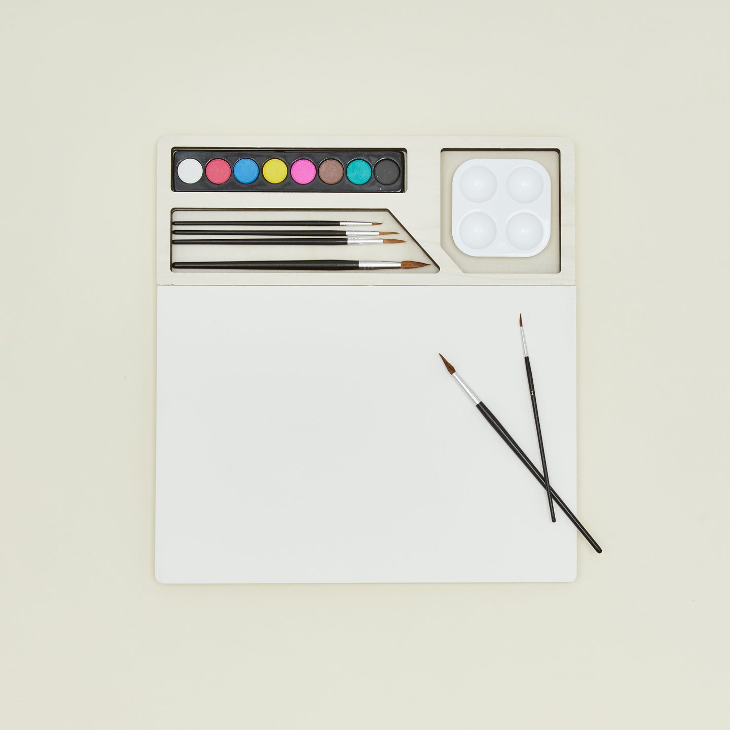 Watercolor set with brushes palette and paper